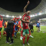 AP PHOTOS: World Cup highlights from Day 19
