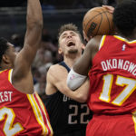 Magic beat Hawks 135-124 for 4th straight victory