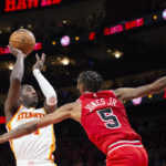 Griffin wins game at OT buzzer, Hawks hold off Bulls 123-122
