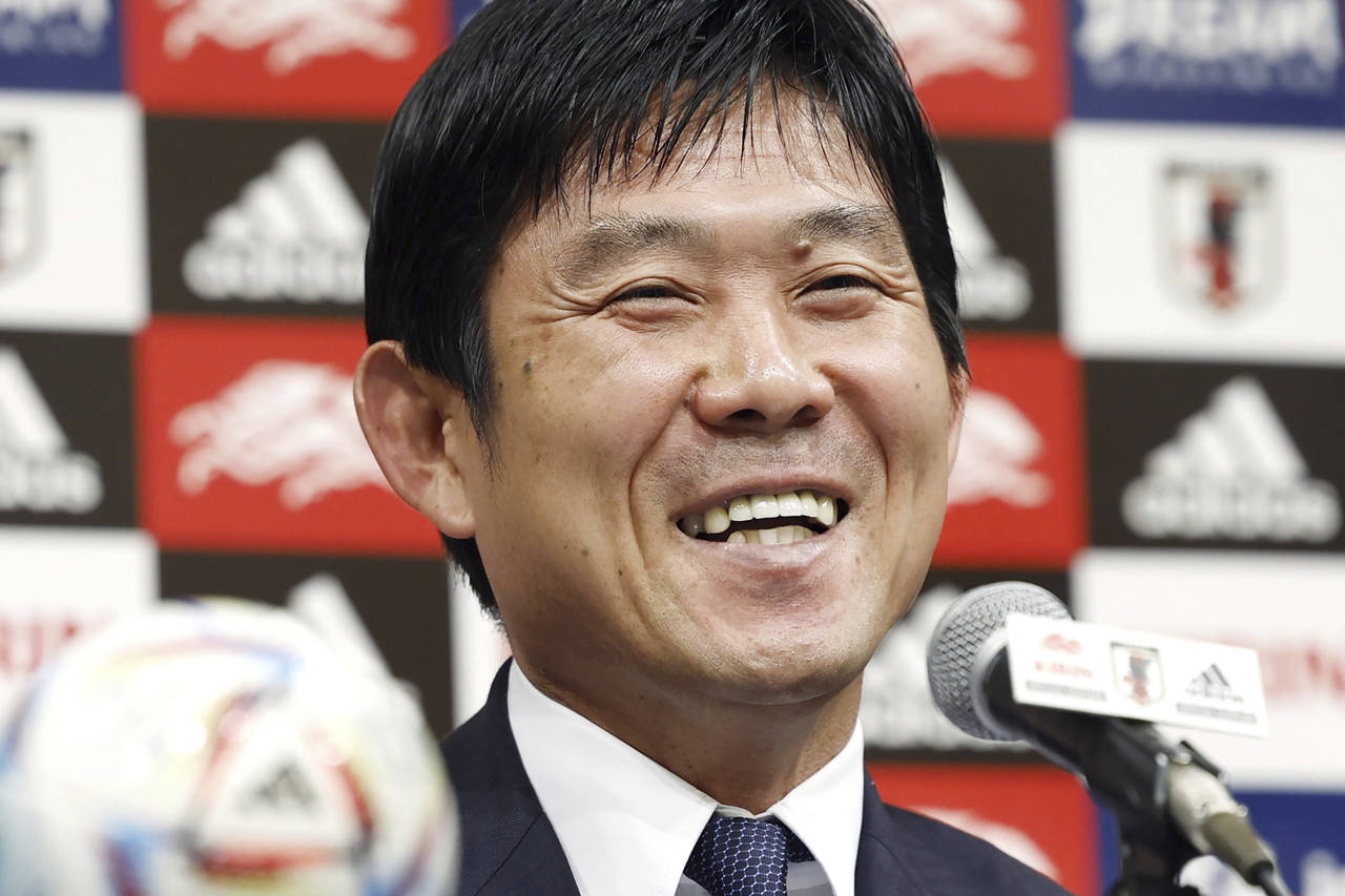 Japan’s national team coach Hajime Moriyasu smiles during a press conference in Tokyo, Wednesday ...