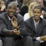 
              Charlotte Bobcats head coach Paul Silas and his son and assistant coach Stephen Silas react in the second half of an NBA basketball game in Charlotte, N.C., Jan. 8, 2011. Silas, a member of three NBA championship teams, has died, his family announced Sunday, Dec. 11, 2022. He was 79. The family revealed the death through the Houston Rockets, for whom Silas' son Stephen is a second-generation head coach. (AP Photo/Bob Leverone)
            