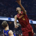 Mitchell scores 34, Cavaliers top Magic 107-96