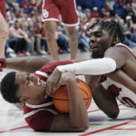Council, Smith lead No. 9 Razorbacks past Sooners 88-78