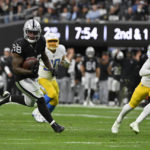 Carr-Adams connection rallies Raiders past Chargers 27-20
