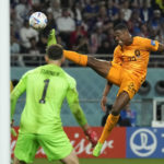 AP PHOTOS: World Cup highlights from Day 14