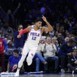 Harris, Embiid carry 76ers past Raptors 104-101 in overtime