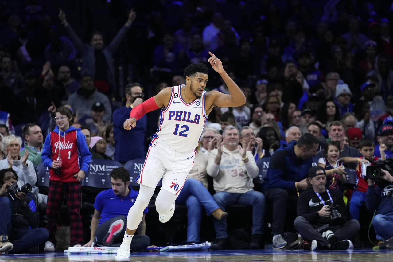 Philadelphia 76ers' Tobias Harris reacts after a basket during the first half of an NBA basketball ...