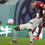 AP PHOTOS: World Cup highlights from Day 13