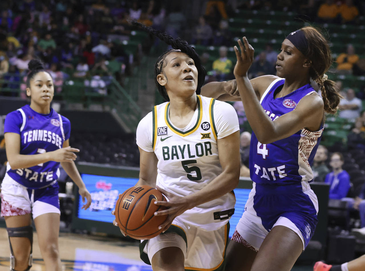 Baylor guard Darianna Littlepage-Buggs (5) drives to the basket past Tennessee State forward Kianni...