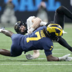 No. 2 Michigan beats Purdue 43-22 for Big Ten crown