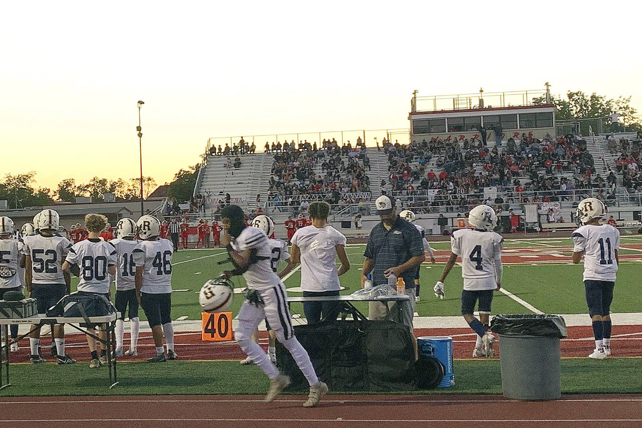 The Rosemont High School football takes the field for a game against Galt High School in Galt, near...