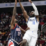 Doncic scores 50, Mavericks edge Rockets 112-106