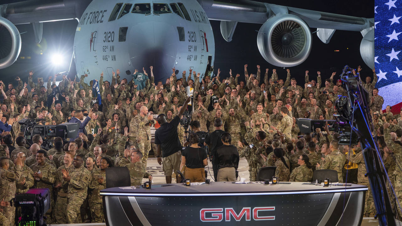 In this handout photo from the U.S. Air Force, American service members participate in a live broad...