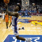 No. 4 Kansas rallies from 15 down to beat Oklahoma St 69-67