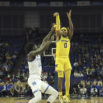 Wallace leads No. 19 Kentucky past Michigan 73-69 in London