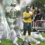 Pelé's health improves, but he remains in hospital