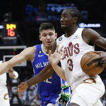 Mitchell scores 36, leads Cavs past Giannis, Bucks 114-106