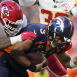 Broncos' Wilson evaluated for concussion against Chiefs