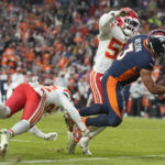 Wilson's concussion latest setback in Broncos' awful year