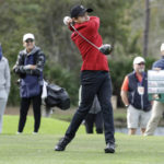 Singh and son finally win PNC as Woods can't make up ground