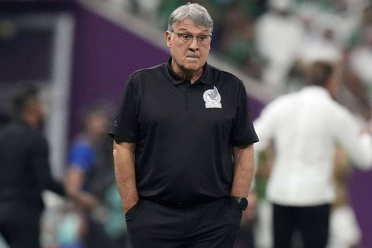 Mexico's head coach Gerardo Martino watches his team during the World Cup group C soccer match betw...