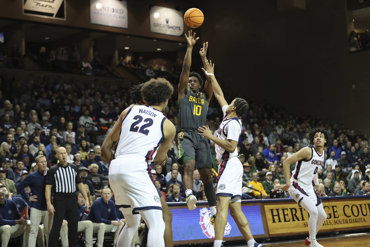 Baylor guard Adam Flagler (10) shoots a fadeaway jump shot during the first half of an NCAA college...