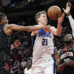 Magic rally past Rockets 116-110 for 7th win in 8 games