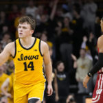 Wahl sparks Wisconsin to 78-75 victory over Iowa in overtime