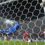 AP PHOTOS: World Cup highlights from Day 23