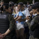 Sea of people try to catch glimpse of Argentina soccer team