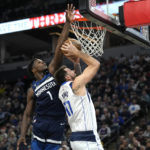Doncic, Mavericks rebound to beat Timberwolves for split
