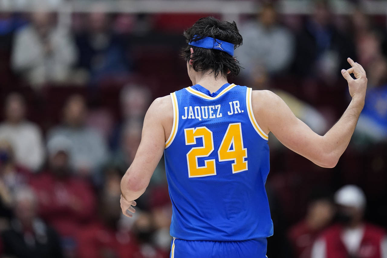 UCLA guard Jaime Jaquez Jr. reacts after scoring a 3-point basket against Stanford during the first...