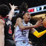 Morant has career-high 17 assists, Grizzlies rout Raptors