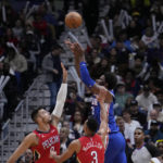 McCollum makes 11 3s, scores 42, Pelicans beat 76ers 127-116