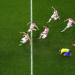 AP PHOTOS: World Cup highlights from Day 18