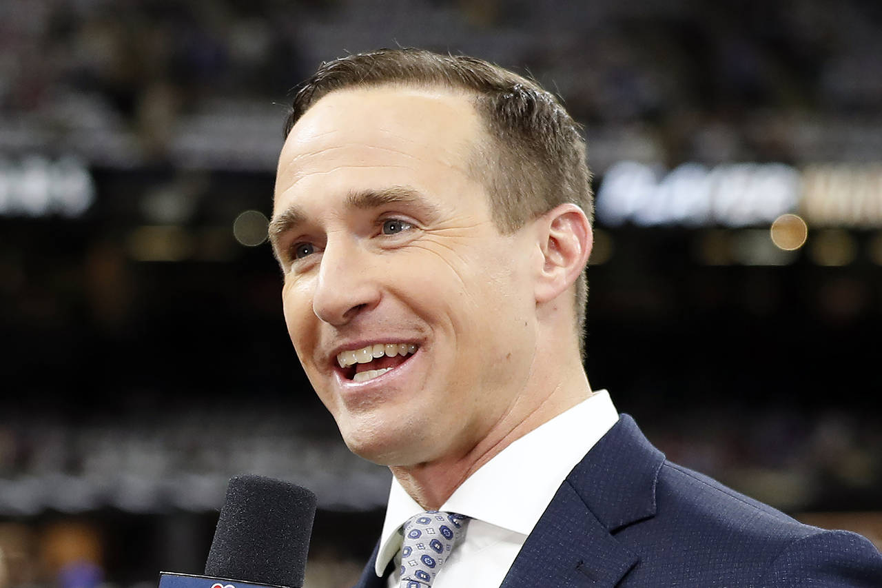 FILE - NBC Sports commentator and former New Orleans Saints quarterback Drew Brees speaks from the ...