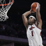 Council, Smith lead No. 9 Razorbacks past Sooners 88-78