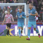 Arsenal fights back to extend league lead to 7 points
