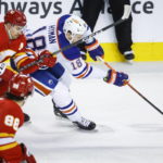 Oilers cash in on late power play to burn Flames 2-1