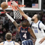 Doncic scores 50, Mavericks edge Rockets 112-106