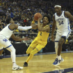Wallace leads No. 19 Kentucky past Michigan 73-69 in London