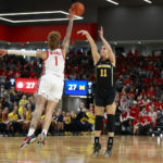 No. 3 OSU's defense forces TOs, tops No. 14 Michigan 66-57
