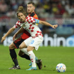 AP PHOTOS: World Cup highlights from Day 12