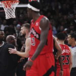 Fox has 27 points and 10 assists, Kings beat Raptors 124-123