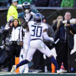 Hurts has 3 TD passes plus TD run, Eagles beat Titans 35-10