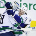 Kuzmenko scores in SO to give Canucks 4-3 win over Flames