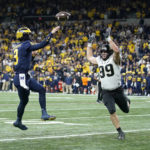 No. 2 Michigan beats Purdue 43-22 for Big Ten crown