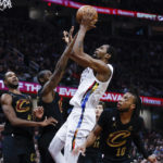 Nets push winning streak to 9 with 125-117 win over Cavs