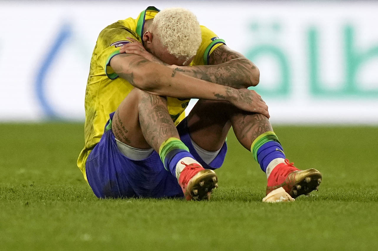 Brazil's Neymar reacts after the penalty shootout at the World Cup quarterfinal soccer match betwee...