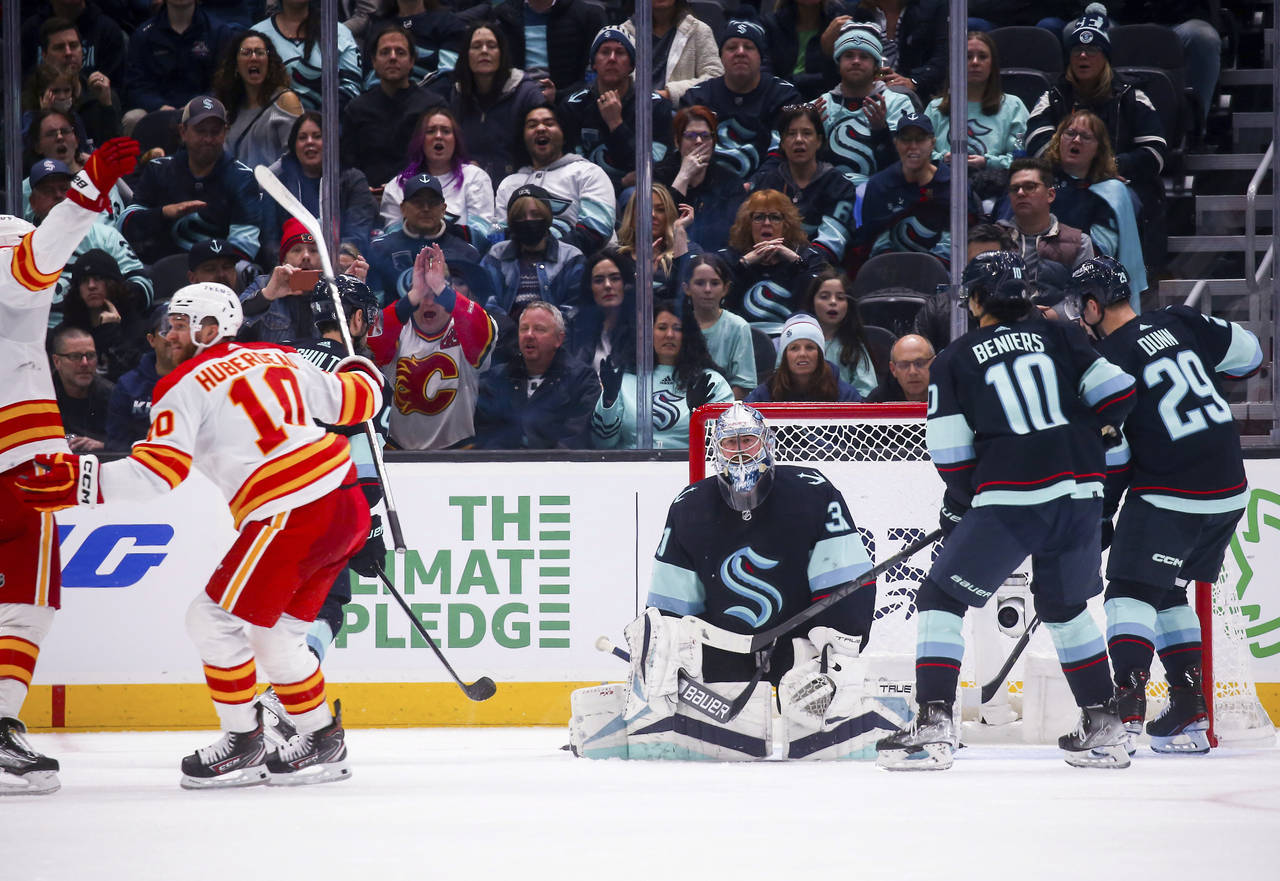 Seattle Kraken goaltender Philipp Grubauer (31) reacts after allowing a goal by Calgary Flames cent...